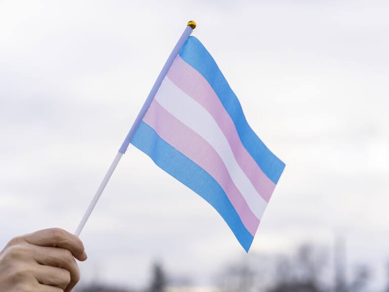 Transgender Flag hold in the sky