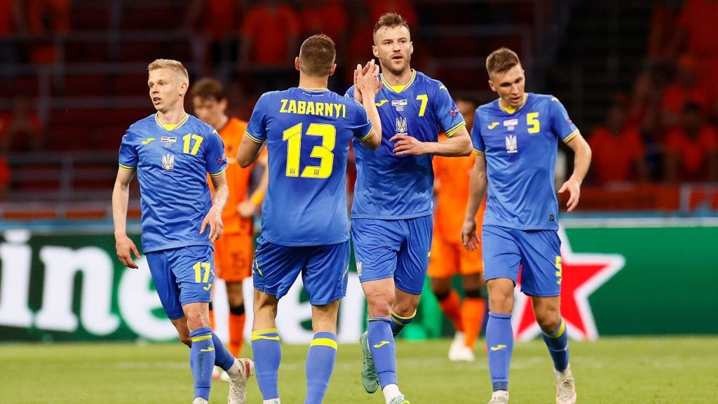 AMSTERDAM, NETHERLANDS - JUNE 13: Andriy Yarmolenko of Ukraine celebrates with Illia Zabarnyi after scoring their side's first goal during the UEFA Euro 2020 Championship Group C match between Netherlands and Ukraine at the Johan Cruijff ArenA on June 13, 2021 in Amsterdam, Netherlands. (Photo by Koen van Weel - Pool/Getty Images)