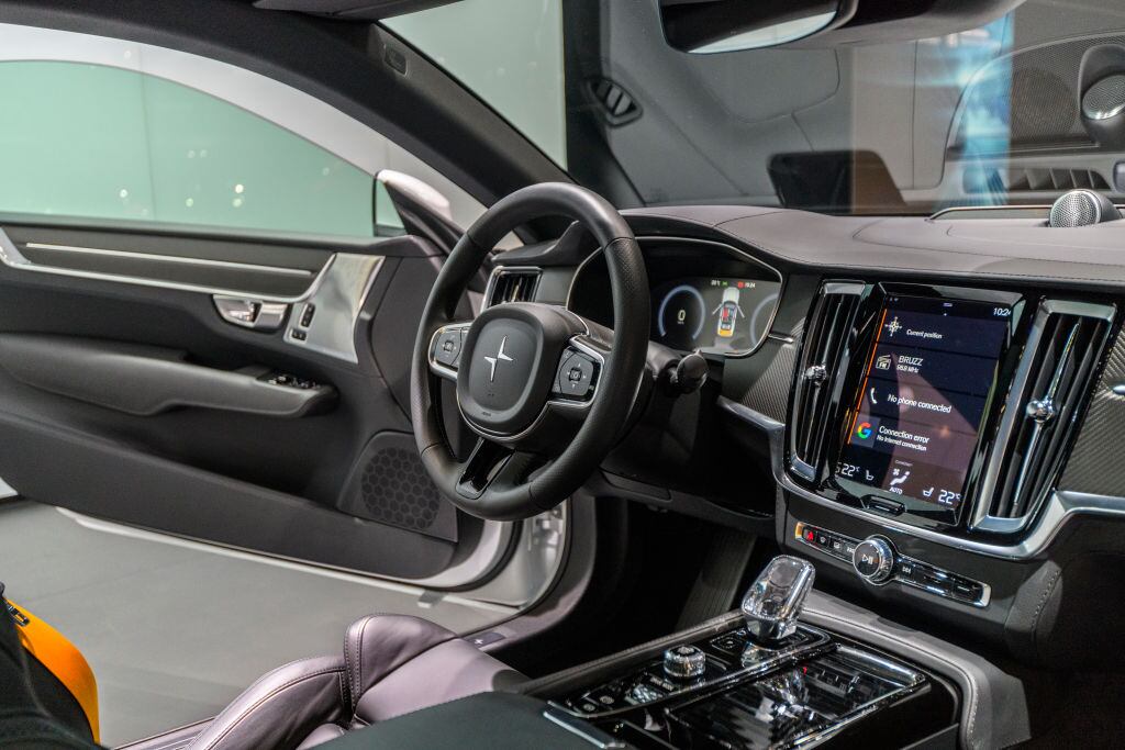 BRUSSELS, BELGIUM - JANUARY 9: Polestar 1 hybrid sports car coupe interior in white on display at Brussels Expo on January 9, 2017 in Brussels, Belgium.  Polestar is the performance company and brand of Volvo Cars now focussed on producing electric and hybrid vehicles. The Polestar 1 is powered by a hybrid powertrain, combining a twincharged 2.0 litre in-line four-cylinder gasoline engine to power the front wheels, with two electric motors driving the rear wheels. (Photo by Sjoerd van der Wal/Getty Images)