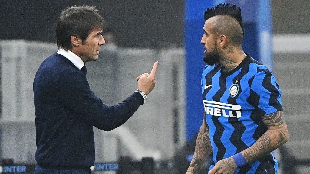 Parma's Italian coach Antonio Conte (L) gives instructions to Inter Milan's Chilean midfielder Arturo Vidal during the Italian Serie A football match Inter Milan vs Parma at the Meazza stadium in Milan on October 31, 2020. (Photo by Vincenzo PINTO / AFP) (Photo by VINCENZO PINTO/AFP via Getty Images)
