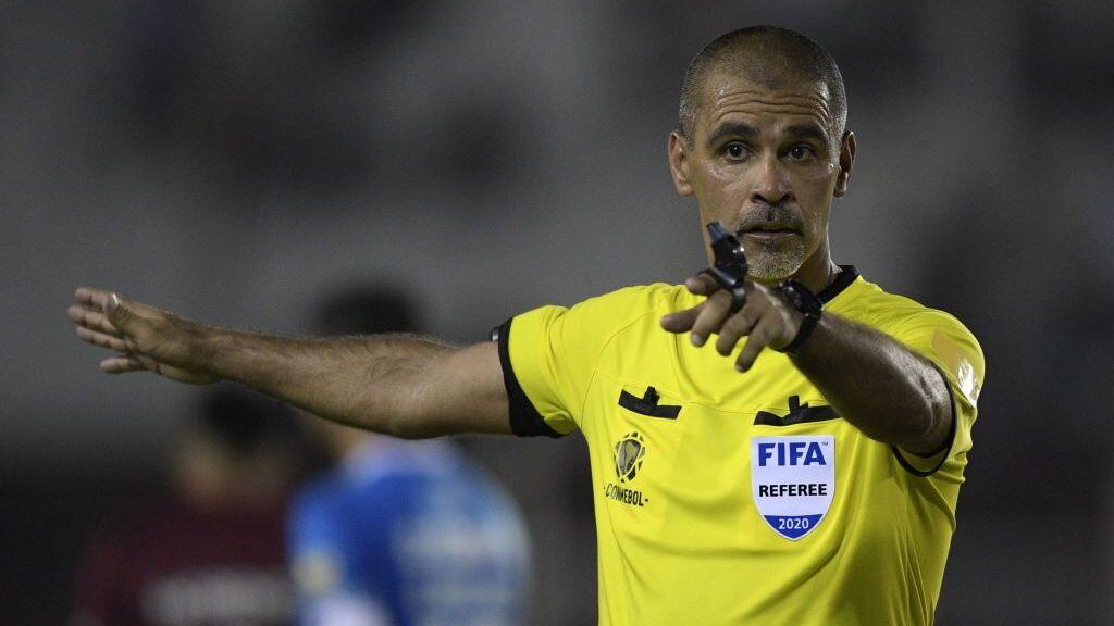 Paraguayan referee Eber Aquino gestures during the Copa Sudamericana first stage first leg football match between Argentina's Lanus and Ecuador's Universidad Catolica at "La Fortaleza" stadium in Lanus, Buenos Aires, Argentina, on February 12, 2020. (Photo by JUAN MABROMATA / AFP) (Photo by JUAN MABROMATA/AFP via Getty Images)