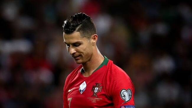 Portuguese soccer star Cristiano Ronaldo has tested positive for COVID-19, Portugals Football Federation said in a statement in Lisbon, Portugal, on October 13, 2020. The 35-year-old Juventus striker will miss Wednesdays UEFA Nations League game against Sweden but is well, has no symptoms and is in isolation, the federation said. (FILE PHOTO) (Photo by Pedro Fiúza/NurPhoto via Getty Images)