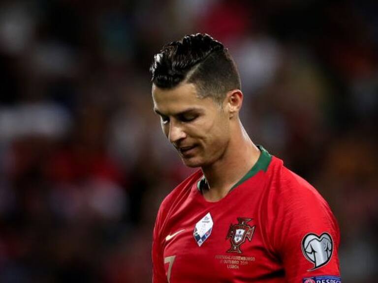 Portuguese soccer star Cristiano Ronaldo has tested positive for COVID-19, Portugals Football Federation said in a statement in Lisbon, Portugal, on October 13, 2020. The 35-year-old Juventus striker will miss Wednesdays UEFA Nations League game against Sweden but is well, has no symptoms and is in isolation, the federation said. (FILE PHOTO) (Photo by Pedro Fiúza/NurPhoto via Getty Images)