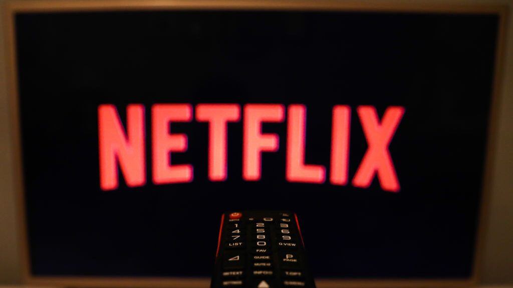Netflix logo is seen displayed on TV screen in this illustration photo taken in Poland on July 16, 2020. On-Demand streaming services gained popularity and new subscribers during the coronavirus pandemic. (Photo Illustration by Jakub Porzycki/NurPhoto via Getty Images)