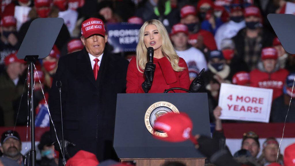 KENOSHA, WISCONSIN - NOVEMBER 02: President Donald Trump listens as his daughter Ivanka Trump speaks during a campaign rally at the Kenosha Regional Airport on November 02, 2020 in Kenosha, Wisconsin. Trump, who won Wisconsin with less than 1 percent of the vote in 2016, currently trails former vice president and Democratic presidential candidate Joe Biden in the state according to recent polls. (Photo by Scott Olson/Getty Images)