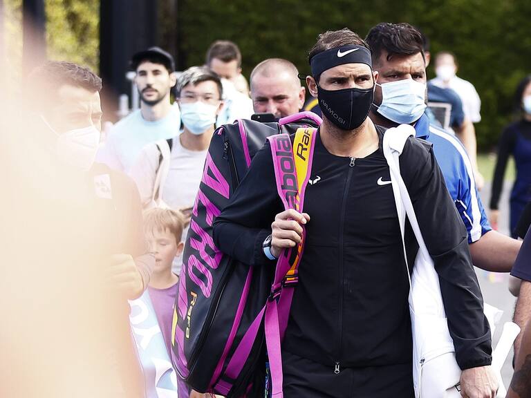 MELBOURNE, AUSTRALIA - JANUARY 04: Rafael Nadal of Spain (C) arrives with Jaume Munar of Spain for their doubles match aagainst Sebastian Baez and Tomas MartinEtcheverry of Argentina during the Melbourne Summer Set at Melbourne Park on January 04, 2022 in Melbourne, Australia. (Photo by Daniel Pockett/Getty Images)