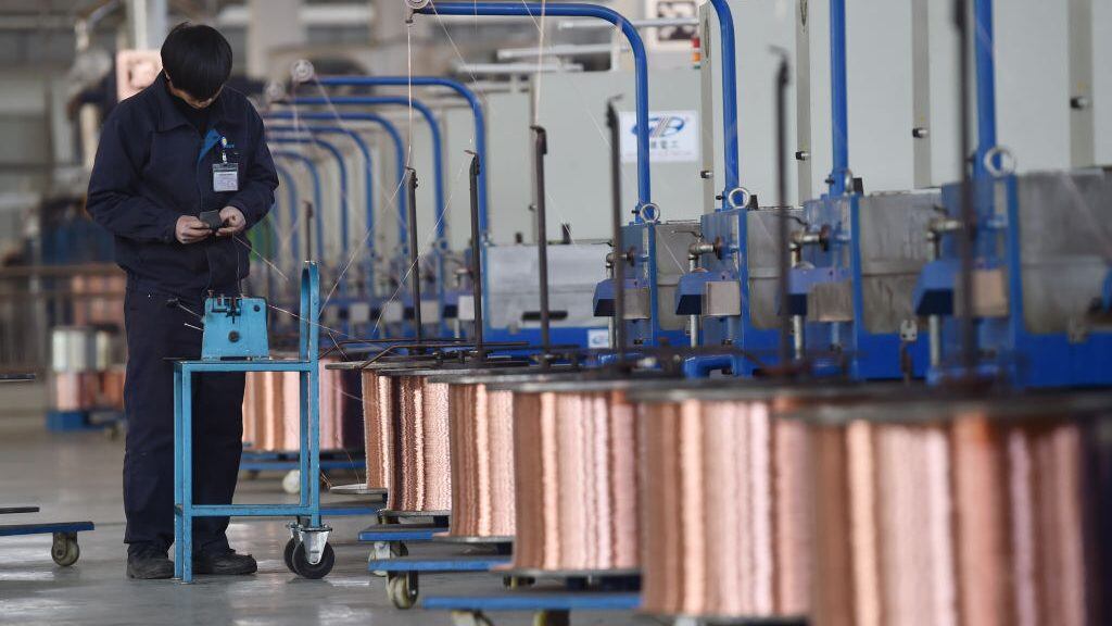 NANJING, CHINA - JANUARY 18: An employee produces copper wires at Nanjing Gree Electric Enterprise Co., Ltd. on January 18, 2021 in Nanjing, Jiangsu Province of China. (Photo by Fang Dongxu/VCG via Getty Images)