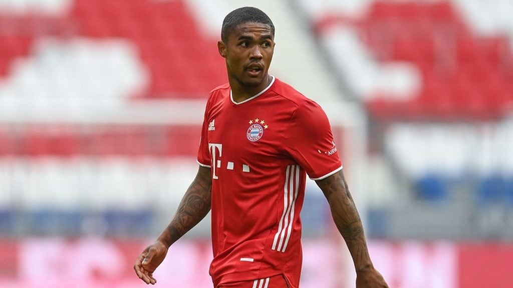 Bayern Munich's Brazilian midfielder Douglas Costa reacts during the German first division Bundesliga football match between FC Bayern Munich and Eintracht Frankfurt on October 24, 2020 in Munich, southern Germany. (Photo by CHRISTOF STACHE / various sources / AFP) / DFL REGULATIONS PROHIBIT ANY USE OF PHOTOGRAPHS AS IMAGE SEQUENCES AND/OR QUASI-VIDEO (Photo by CHRISTOF STACHE/POOL/AFP via Getty Images)