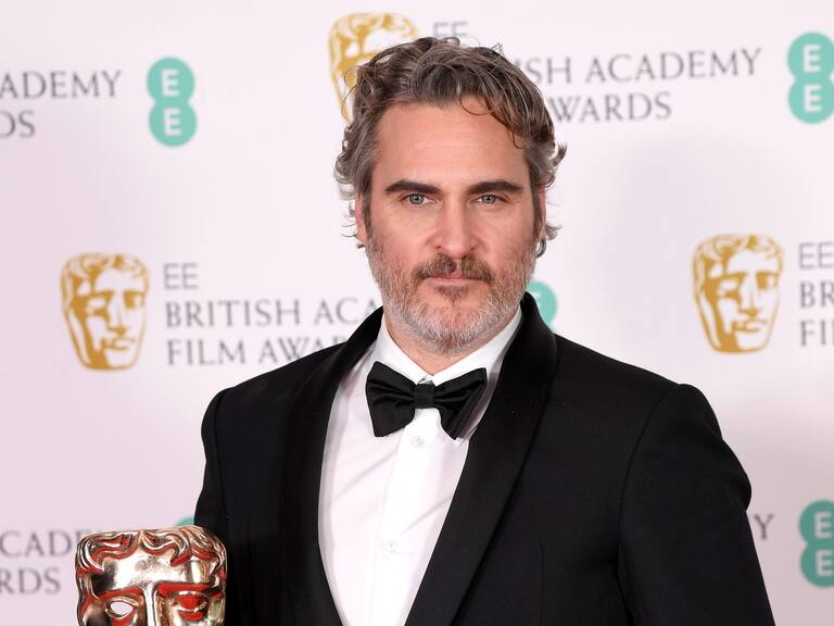 LONDON, ENGLAND - FEBRUARY 02: Joaquin Phoenix with his Best Actor award for "The Joker' poses in the Winners Room during the EE British Academy Film Awards 2020 at Royal Albert Hall on February 02, 2020 in London, England. (Photo by Karwai Tang/WireImage)