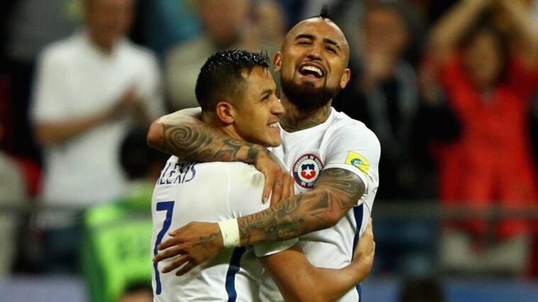 KAZAN, RUSSIA - JUNE 28: Alexis Sanchez of Chile celebrates scoring his sides third penalty with Arturo Vidal of Chile during the FIFA Confederations Cup Russia 2017 Semi-Final between Portugal and Chile at Kazan Arena on June 28, 2017 in Kazan, Russia. (Photo by Ian Walton/Getty Images)