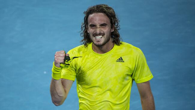 MELBOURNE, AUSTRALIA - FEBRUARY 17: Stefanos Tsitsipas of Greece celebrates after beating Rafael Nadal of Spain during day 10 of the 2021 Australian Open at Melbourne Park on February 17, 2021 in Melbourne, Australia. (Photo by TPN/Getty Images)
