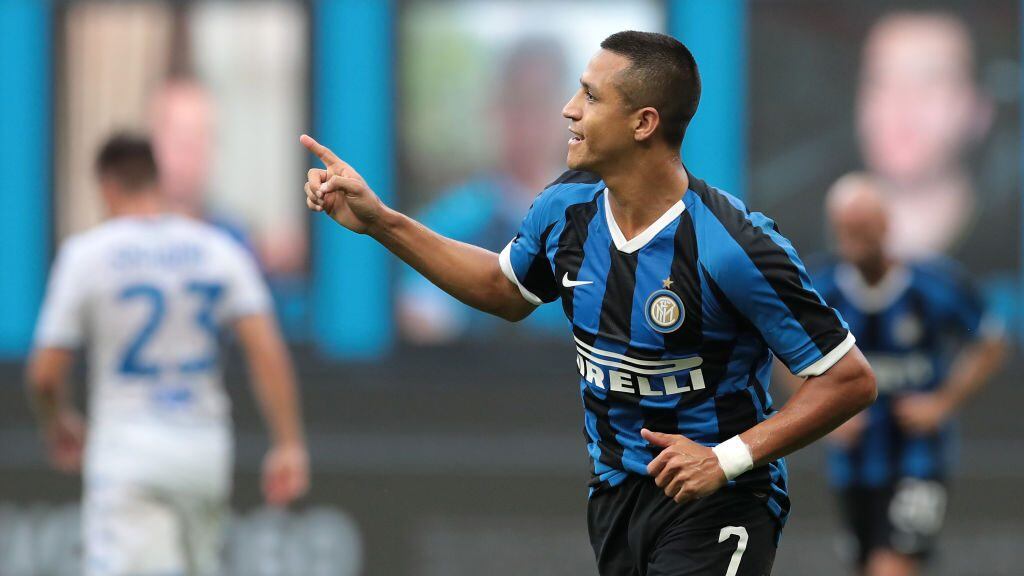 MILAN, ITALY - JULY 01: Alexis Sanchez of FC Internazionale celebrates after scoring the second goal of his team via penalty during the Serie A match between FC Internazionale and Brescia Calcio at Stadio Giuseppe Meazza on July 1, 2020 in Milan, Italy. (Photo by Emilio Andreoli/Getty Images)