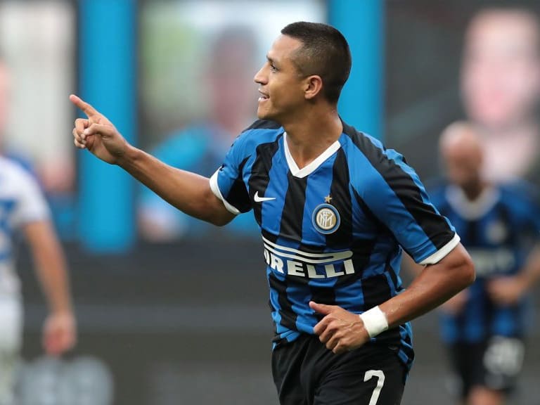 MILAN, ITALY - JULY 01:  Alexis Sanchez of FC Internazionale celebrates after scoring the second goal of his team via penalty during the Serie A match between FC Internazionale and Brescia Calcio at Stadio Giuseppe Meazza on July 1, 2020 in Milan, Italy.  (Photo by Emilio Andreoli/Getty Images)