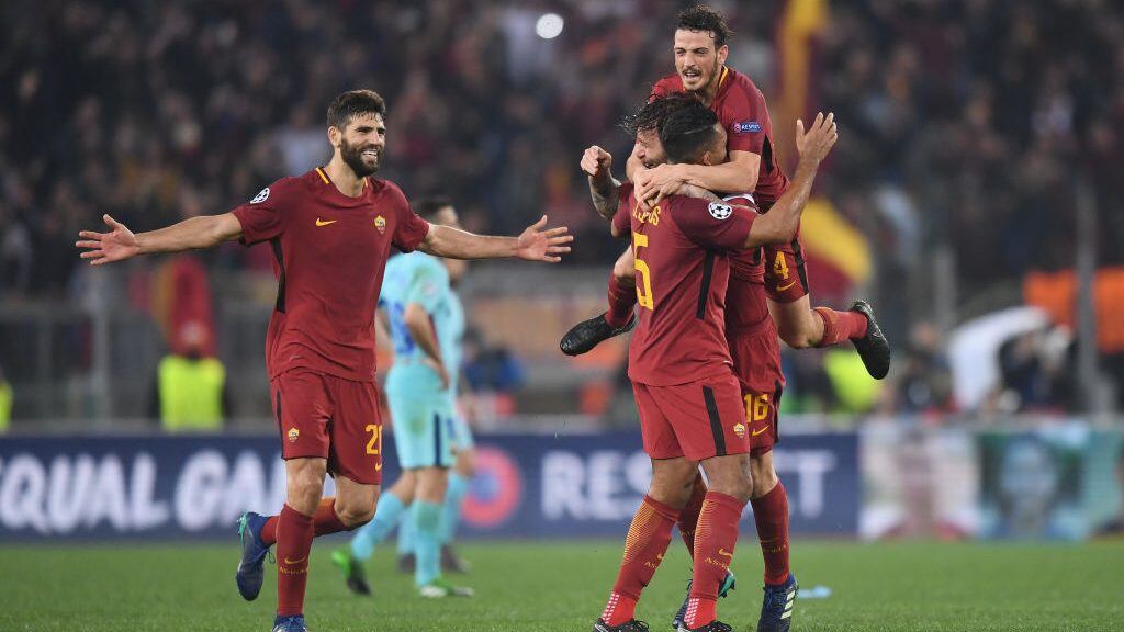 ROME, ITALY - APRIL 10:  Federico Fazio of AS Roma celebrates his sides victory with team mates Alessandro Florenzi Juan Jesus and Daniele De Rossi after the UEFA Champions League Quarter Final Second Leg match between AS Roma and FC Barcelona at Stadio Olimpico on April 10, 2018 in Rome, Italy.  (Photo by Michael Regan/Getty Images)