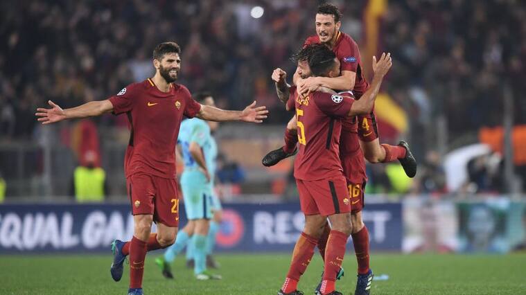 ROME, ITALY - APRIL 10: Federico Fazio of AS Roma celebrates his sides victory with team mates Alessandro Florenzi Juan Jesus and Daniele De Rossi after the UEFA Champions League Quarter Final Second Leg match between AS Roma and FC Barcelona at Stadio Olimpico on April 10, 2018 in Rome, Italy. (Photo by Michael Regan/Getty Images)