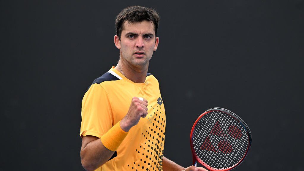 MELBOURNE, AUSTRALIA - JANUARY 18: Tomas Barrios Vera of Chile celebrates after winning a point in his first round singles match against Taro Daniel of Japan during day two of the 2022 Australian Open at Melbourne Park on January 18, 2022 in Melbourne, Australia. (Photo by Quinn Rooney/Getty Images)