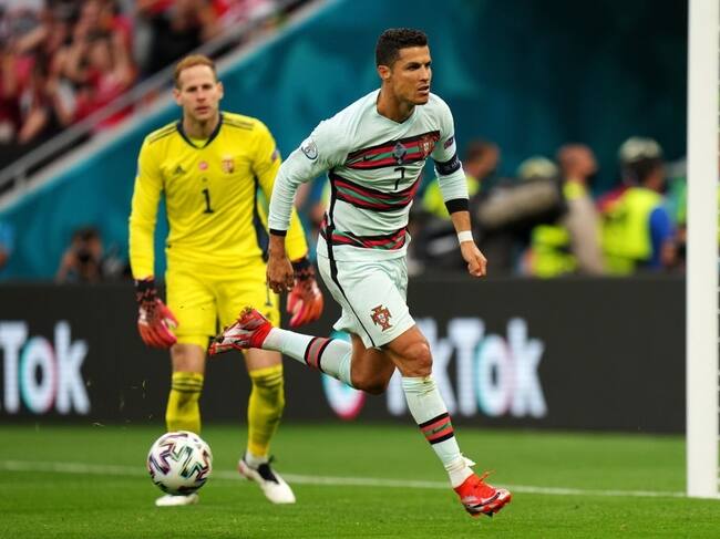 BUDAPEST, HUNGARY - JUNE 15: Cristiano Ronaldo of Portugal celebrates after scoring their side's second goal during the UEFA Euro 2020 Championship Group F match between Hungary and Portugal at Puskas Arena on June 15, 2021 in Budapest, Hungary. (Photo by Angel Martinez - UEFA/UEFA via Getty Images)