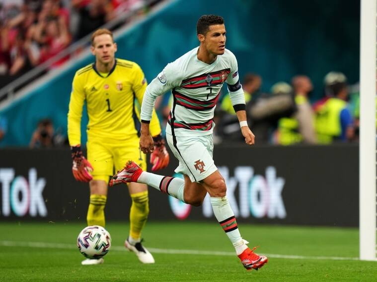 BUDAPEST, HUNGARY - JUNE 15: Cristiano Ronaldo of Portugal celebrates after scoring their side's second goal during the UEFA Euro 2020 Championship Group F match between Hungary and Portugal at Puskas Arena on June 15, 2021 in Budapest, Hungary. (Photo by Angel Martinez - UEFA/UEFA via Getty Images)