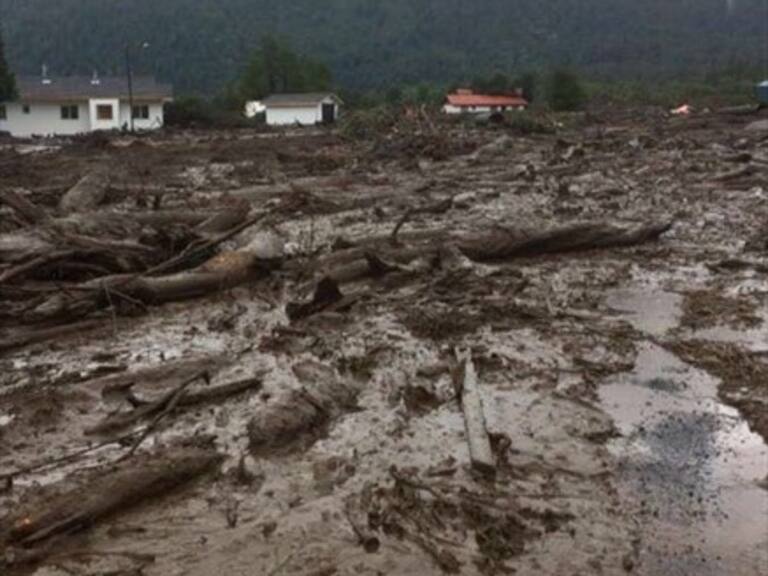 Rebajan a cuatro cifra de muertos por aluvión que arrasó con villa en Chaitén
