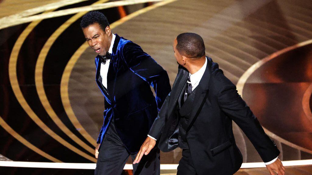 HOLLYWOOD, CA - March 27, 2022.    Will Smith slaps Chris Rock onstage during the show  at the 94th Academy Awards at the Dolby Theatre at Ovation Hollywood on Sunday, March 27, 2022.  (Myung Chun / Los Angeles Times via Getty Images)