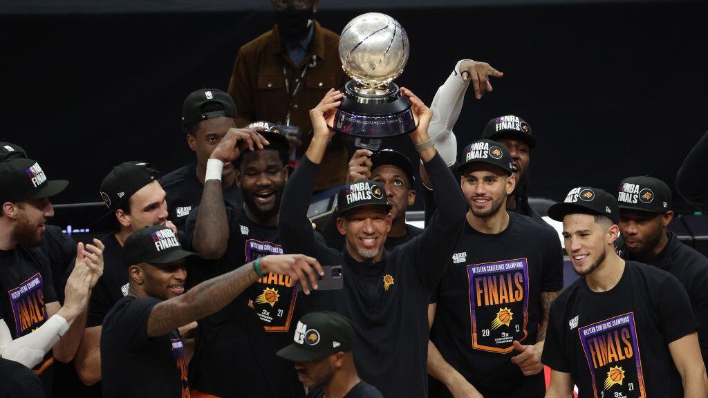 LOS ANGELES, CALIFORNIA - JUNE 30: Head coach Monty Williams of the Phoenix Suns holds the Western Conference Championship trophy after the Suns defeated the LA Clippers in Game Six of the Western Conference Finals at Staples Center on June 30, 2021 in Los Angeles, California. NOTE TO USER: User expressly acknowledges and agrees that, by downloading and or using this photograph, User is consenting to the terms and conditions of the Getty Images License Agreement. (Photo by Ronald Martinez/Getty Images)