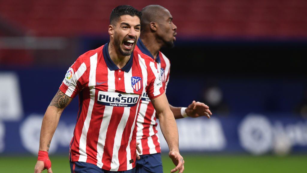 MADRID, SPAIN - FEBRUARY 08: Luis Suarez of Atletico de Madrid celebrates after scoring his team's second goal during the La Liga Santander match between Atletico de Madrid and RC Celta at Estadio Wanda Metropolitano on February 08, 2021 in Madrid, Spain. Sporting stadiums around Spain remain under strict restrictions due to the Coronavirus Pandemic as Government social distancing laws prohibit fans inside venues resulting in games being played behind closed doors. (Photo by Denis Doyle/Getty Images)