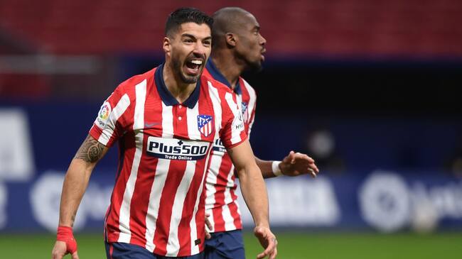 MADRID, SPAIN - FEBRUARY 08: Luis Suarez of Atletico de Madrid celebrates after scoring his team's second goal during the La Liga Santander match between Atletico de Madrid and RC Celta at Estadio Wanda Metropolitano on February 08, 2021 in Madrid, Spain. Sporting stadiums around Spain remain under strict restrictions due to the Coronavirus Pandemic as Government social distancing laws prohibit fans inside venues resulting in games being played behind closed doors. (Photo by Denis Doyle/Getty Images)