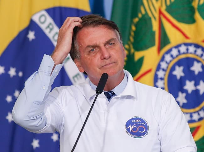 Brazil's President Jair Bolsonaro attends a ceremony at the Planalto Palace in Brasilia, Brazil on January 12, 2021. (Photo by Sergio Lima / AFP) (Photo by SERGIO LIMA/AFP via Getty Images)