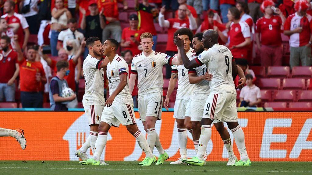 Belgium's midfielder Kevin De Bruyne (C) celebrates with teammates after scoring his team's second goal during the UEFA EURO 2020 Group B football match between Denmark and Belgium at the Parken Stadium in Copenhagen on June 17, 2021. (Photo by WOLFGANG RATTAY / POOL / AFP) (Photo by WOLFGANG RATTAY/POOL/AFP via Getty Images)