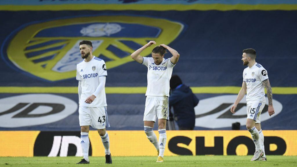 Leeds United's Mateusz Klich (left), Luke Ayling (centre) and Stuart Dallas appear dejected after Brighton and Hove Albion score their first goal during the Premier League match at Elland Road, Leeds. (Photo by Peter Powell/PA Images via Getty Images)