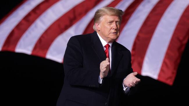 DALTON, GEORGIA - JANUARY 04: U.S. President Donald Trump arrives at a Republican National Committee Victory Rally at Dalton Regional Airport January 4, 2021 in Dalton, Georgia. President Trump campaigned for the two incumbents, Sen. David Perdue (R-GA) and Sen. Kelly Loeffler (R-GA), for tomorrow’s runoff elections in Georgia. (Photo by Alex Wong/Getty Images)