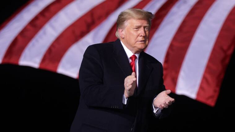 DALTON, GEORGIA - JANUARY 04: U.S. President Donald Trump arrives at a Republican National Committee Victory Rally at Dalton Regional Airport January 4, 2021 in Dalton, Georgia. President Trump campaigned for the two incumbents, Sen. David Perdue (R-GA) and Sen. Kelly Loeffler (R-GA), for tomorrow’s runoff elections in Georgia. (Photo by Alex Wong/Getty Images)