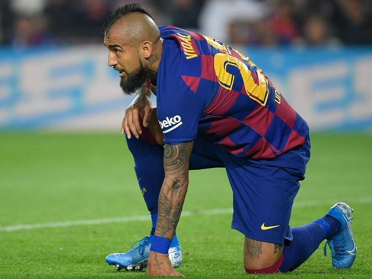 Barcelona's Chilean midfielder Arturo Vidal kneels on the field during the Spanish league football match between FC Barcelona and Real Valladolid FC at the Camp Nou stadium in Barcelona on October 29, 2019. (Photo by LLUIS GENE / AFP) (Photo by LLUIS GENE/AFP via Getty Images)