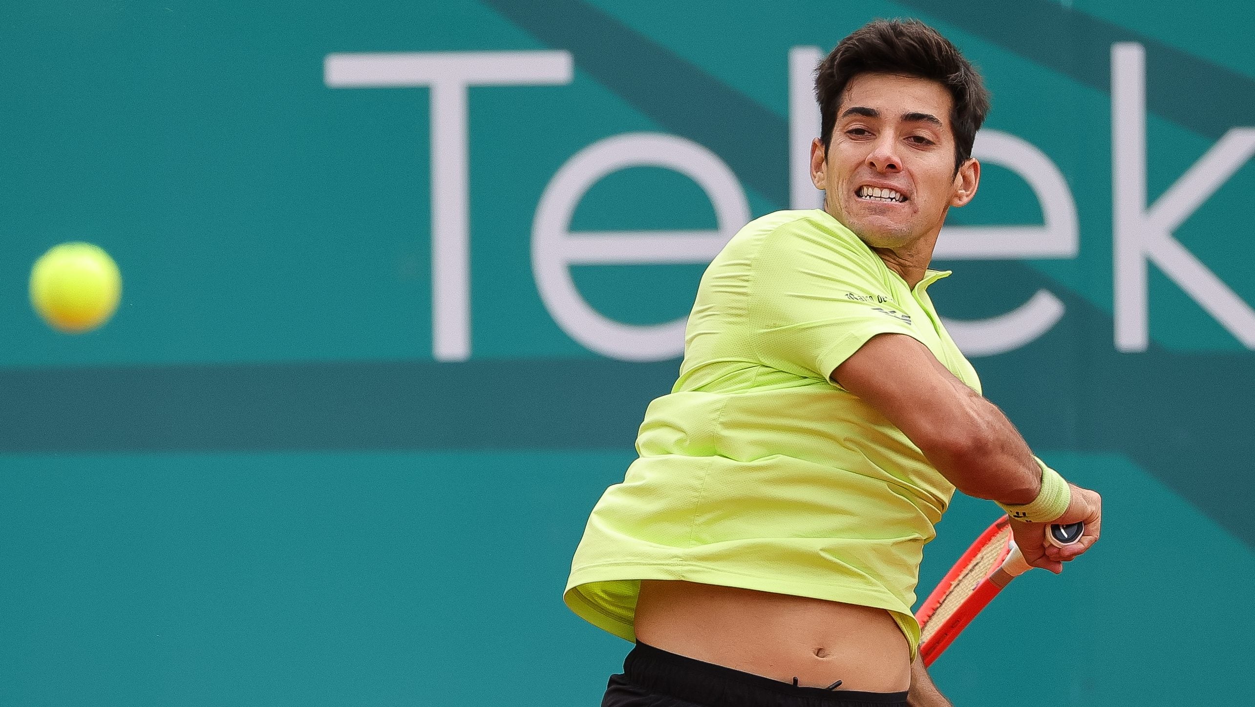 BELGRADE, SERBIA - APRIL 18: Cristian Garin of Chile in action against Holger Rune of denmark during day one of the Serbia Open ATP 250 Tournament at Novak Tennis Centre on April 18, 2022 in Belgrade, Serbia. (Photo by Srdjan Stevanovic/Getty Images)