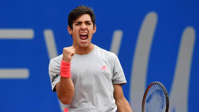 Chile's Christian Garin celebrates at the end of his final match against Italy's Matteo Berrettini (not in picture) at the ATP tennis BMW Open in Munich, southern Germany, on May 5, 2019. (Photo by Christof STACHE / AFP)