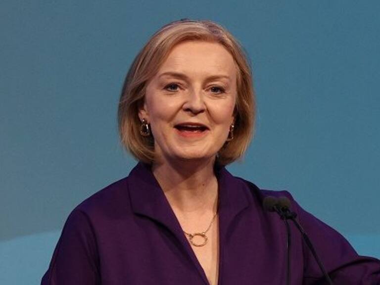 New Conservative Party leader and Britain's Prime Minister-elect Liz Truss gestures as she delivers a speech at an event to announce the winner of the Conservative Party leadership contest in central London on September 5, 2022. - Truss is the UK's third female prime minister following Theresa May and Margaret Thatcher. The 47-year-old has consistently enjoyed overwhelming support over 42-year-old Sunak in polling of the estimated 200,000 Tory members who were eligible to vote. (Photo by Adrian DENNIS / AFP) (Photo by ADRIAN DENNIS/AFP via Getty Images)
