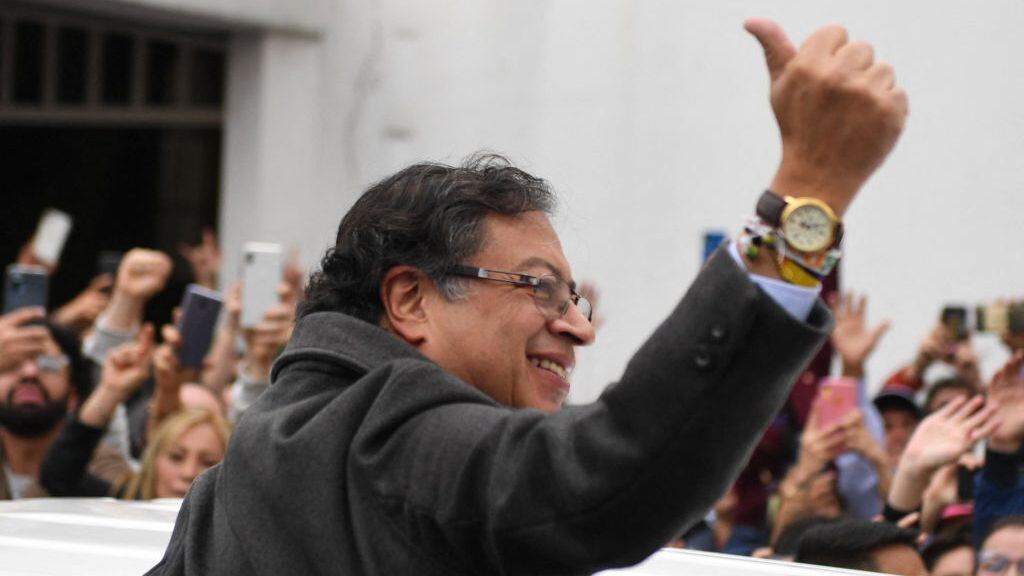 Colombian left-wing presidential candidate Gustavo Petro gives the thumb up as he arrives at a polling station during the presidential runoff election in Bogota, on June 19, 2022. - Colombians vote for a new president in an election filled with uncertainty, as former guerrilla Gustavo Petro and millionaire businessman Rodolfo Hernandez vie for power in a country saddled with widespread poverty, violence and other woes. (Photo by Daniel MUNOZ / AFP) (Photo by DANIEL MUNOZ/AFP via Getty Images)