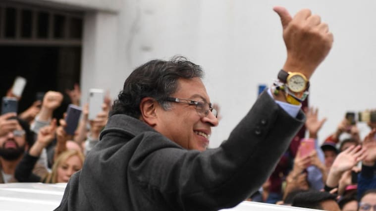 Colombian left-wing presidential candidate Gustavo Petro gives the thumb up as he arrives at a polling station during the presidential runoff election in Bogota, on June 19, 2022. - Colombians vote for a new president in an election filled with uncertainty, as former guerrilla Gustavo Petro and millionaire businessman Rodolfo Hernandez vie for power in a country saddled with widespread poverty, violence and other woes. (Photo by Daniel MUNOZ / AFP) (Photo by DANIEL MUNOZ/AFP via Getty Images)