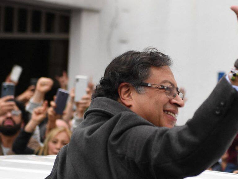 Colombian left-wing presidential candidate Gustavo Petro gives the thumb up as he arrives at a polling station during the presidential runoff election in Bogota, on June 19, 2022. - Colombians vote for a new president in an election filled with uncertainty, as former guerrilla Gustavo Petro and millionaire businessman Rodolfo Hernandez vie for power in a country saddled with widespread poverty, violence and other woes. (Photo by Daniel MUNOZ / AFP) (Photo by DANIEL MUNOZ/AFP via Getty Images)