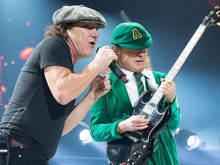 KANSAS CITY, MO - FEBRUARY 28: Singer Brian Johnson (L) and musician Angus Young of AC/DC performs at Sprint Center on February 28, 2016 in Kansas City, Missouri. (Photo by Jason Squires/WireImage)