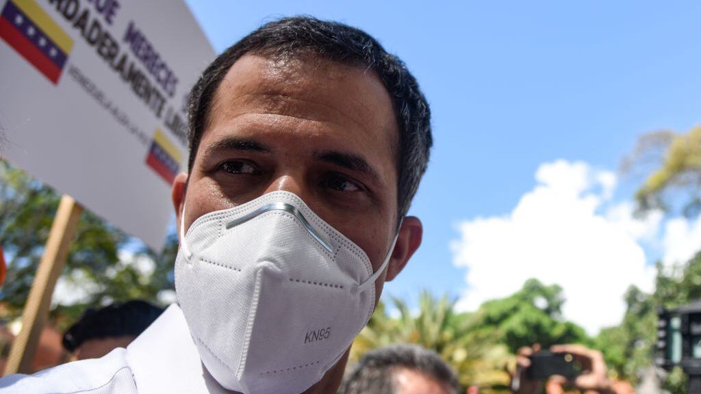 CARACAS, VENEZUELA - DECEMBER 12: Juan Guaido, Venezuelan opposition leader and  recognized by many members of the international community as the country's rightful interim ruler,  arrives to Bolivar Square to address to the media in Chacao on December 12, 2020 in Caracas, Venezuela. After one week of online voting, people con vote in-person at polling stations. The survey asks Venezuelans if they want President Nicolas Maduro to step down and fresh elections to be hold while seeking greater support from international community. A week ago, the ruling party won congressional elections boycotted by opposition where only 31% of allowed voters casted ballots. (Photo by Carolina Cabral/Getty Images)
