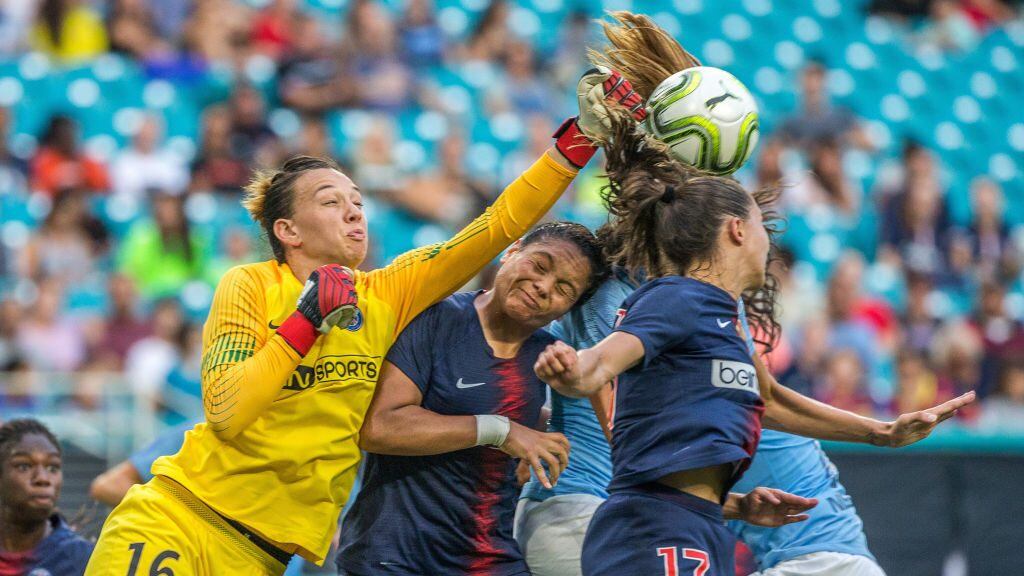 PSG goalkeeper Christiane Endler (16) fails to stop a cross and allows Jill Scott, surrounded by defenders, to score during the third place match of the Women's International Champions Cup between Manchester City and Paris Saint-Germain at Hard Rock Stadium in Miami Gardens, Fla. on Sunday, July 29, 2018. (Sam Navarro/Miami Herald/Tribune News Service via Getty Images)