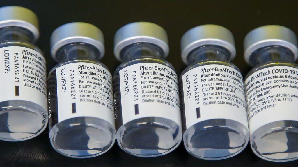 LONDON, UNITED KINGDOM - 2021/05/20: A view of vials containing Pfizer BioNTech Covid-19 vaccine.To date more than 37 million people have had a first vaccine dose in UK which is equivalent to about 70% of the adult population - and more than 21 million have had a second. UK is among the nations with the highest rate of vaccinations per 100 people in the world. (Photo by Dinendra Haria/SOPA Images/LightRocket via Getty Images)