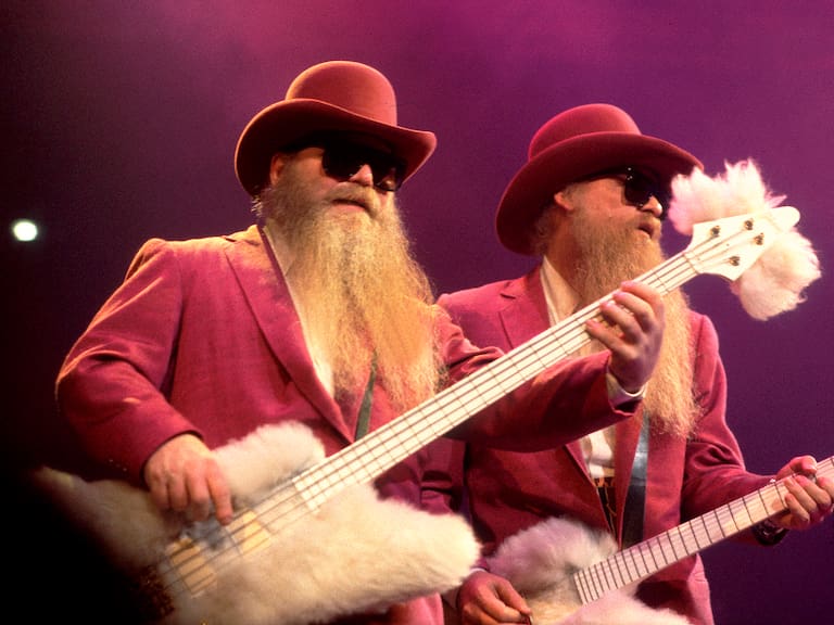 American Rock musicians Dusty Hill (left)and Billy Gibbons, both of the group ZZ Top, perform onstage at the Bradley Center, Milwaukee, Wisconsin, October 31, 1990. (Photo by Paul Natkin/Getty Images)