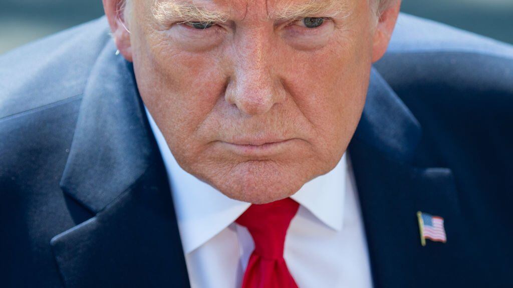 US President Donald Trump speaks to the media after arriving on the South Lawn of the White House in Washington, DC, July 30, 2019, following a trip to the 400th anniversary of Jamestown, Virginia. (Photo by SAUL LOEB / AFP) (Photo by SAUL LOEB/AFP via Getty Images)
