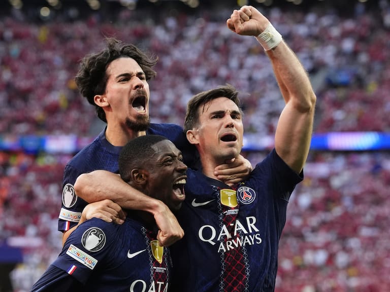 Paris Saint-Germain's Ousmane Dembele (centre) celebrates with team-mates Vitinha (left) and Fabian Ruiz after scoring their side's first goal of the game from the penalty spot during the UEFA Champions League Final at the Puskas Arena, Budapest. Picture date: Saturday May 30, 2026. (Photo by Nick Potts/PA Images via Getty Images)