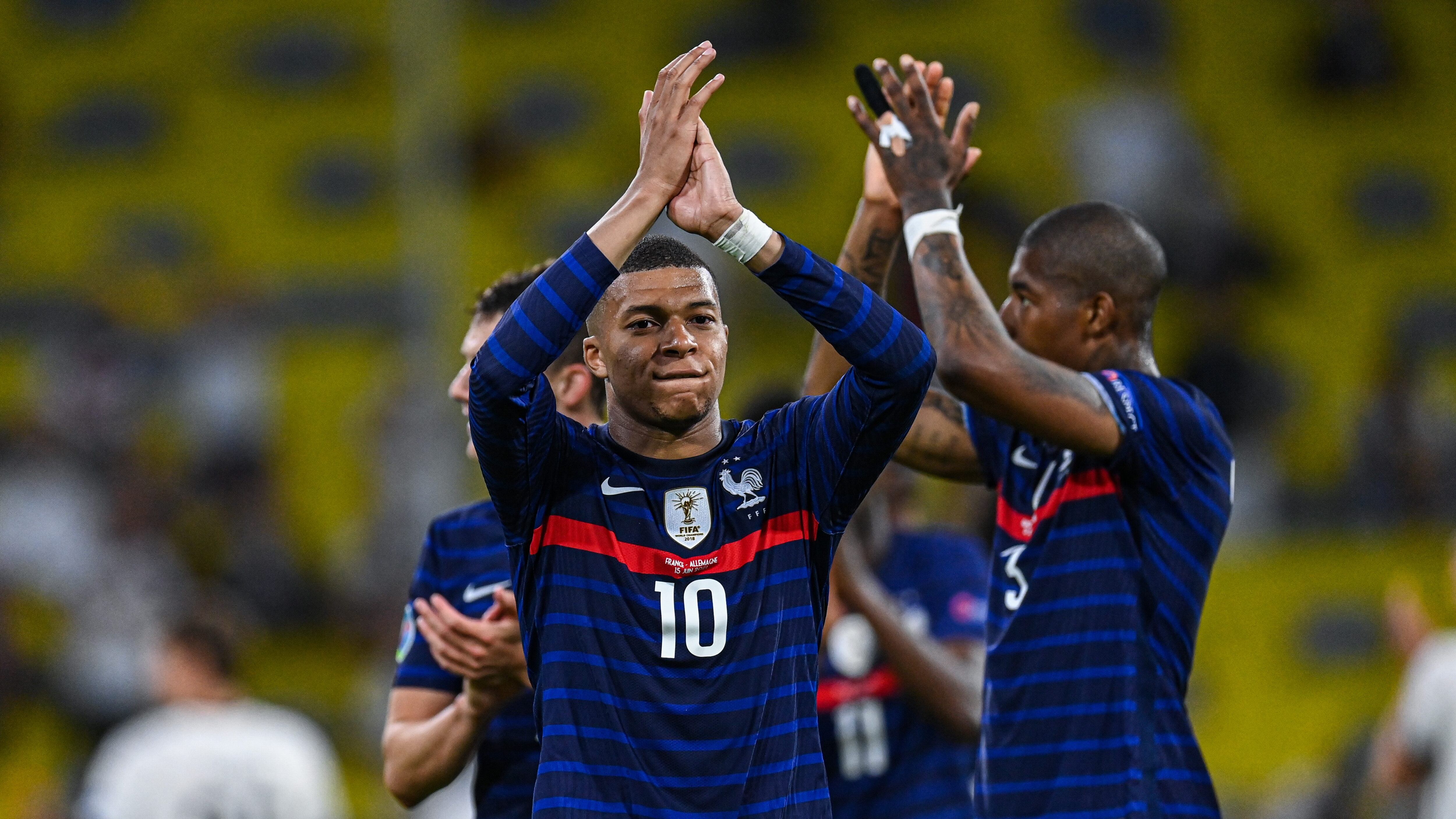 MUNICH, GERMANY - JUNE 15: Kylian Mbappe of France celebrates after winning the UEFA Euro 2020 Championship Group F match between France and Germany at Allianz Arena on June 15, 2021 in Munich, Germany. (Photo by Markus Gilliar/Getty Images)