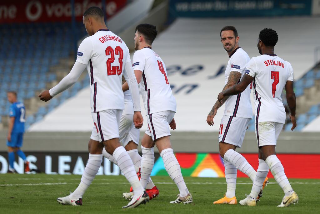 REYKJAVIK, ICELAND - SEPTEMBER 05: Raheem Sterling of England celebrates with Danny Ings after scoring his sides first goal from the penalty spot during the UEFA Nations League group stage match between Iceland and England at Laugardalsvollur National Stadium on September 05, 2020 in Reykjavik, Iceland. (Photo by Haflidi Breidfjord/Getty Images)