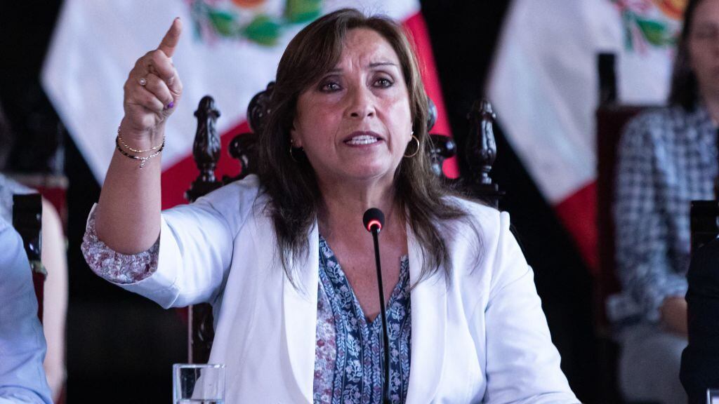 Peruvian President Dina Boluarte speaks during a conference at the Government Palace in Lima, on December 17, 2022. - Boluarte said on Saturday she would remain in office and asked Congress to bring forward general elections to end the crisis and protests sparked by the impeachment of her predecessor, Pedro Castillo. (Photo by Lucas AGUAYO / AFP) (Photo by LUCAS AGUAYO/AFP via Getty Images)
