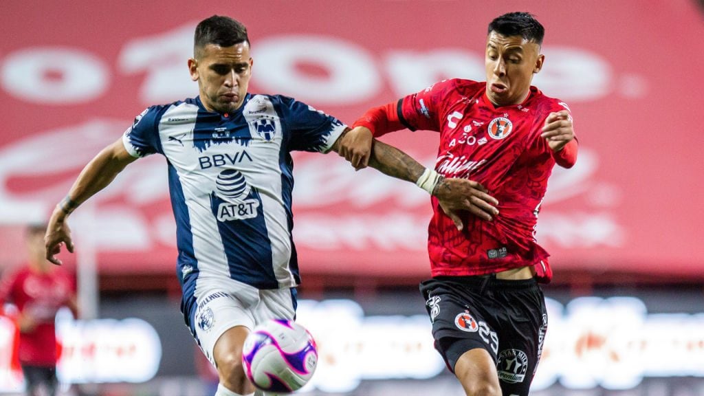 TIJUANA, MEXICO - OCTOBER 21: Sebastian Vegas of Monterrey fights for the ball with Edgar Lopez of Tijuana during the Final first leg match between Tijuana and Monterrey as part of the Copa MX 2020 at Caliente Stadium on October 21, 2020 in Tijuana, Mexico. (Photo by Carlos Heredia/Getty Images)
